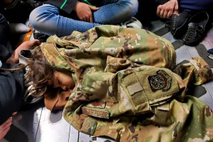 Airman who helped with Afghan evacuations donates blouse from iconic photo