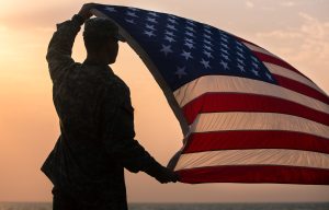 Stranger buys plane ticket to reunite soldier with his family