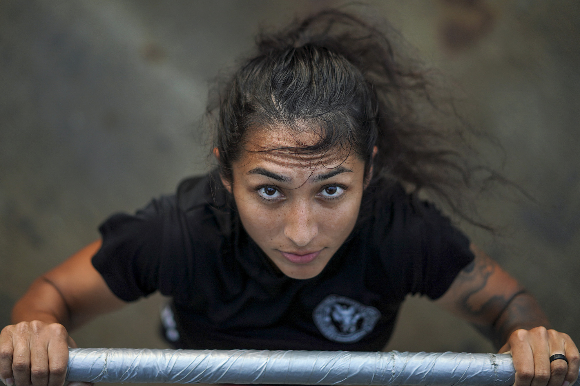 Hospital Corpsman 2nd Class Elizabeth R. Pinon, assigned to the Arleigh Burke-class guided-missile destroyer USS Halsey (DDG 97), exercises topside on Sept. 4, 2020, while in the South China Sea.