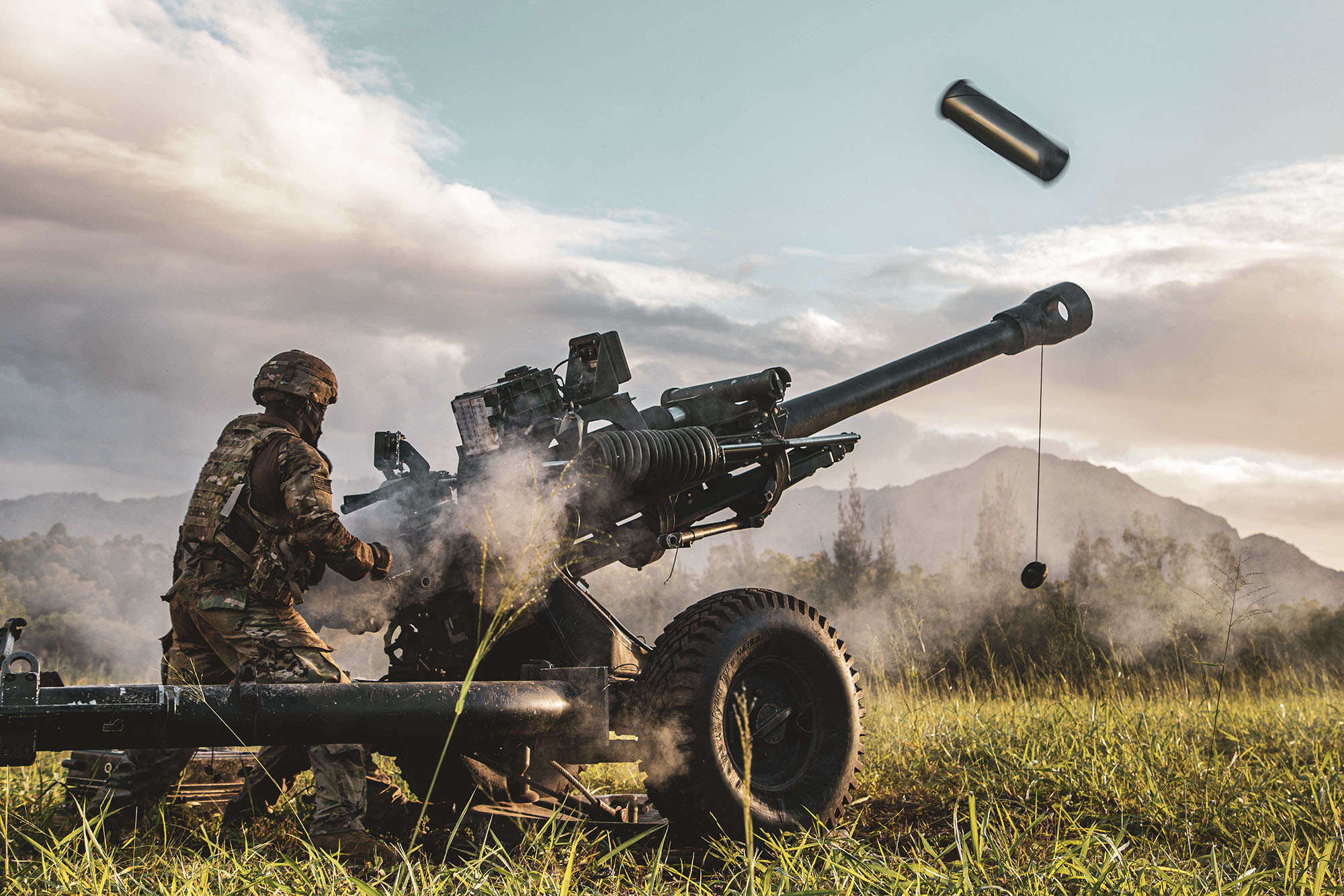 Service members participate in an exercise called Operation Wardog Kila for a joint live-fire exercise at Schofield Barracks, Hawaii, Dec. 30, 2020, with the 25th Combat Aviation Brigade, 25th Infantry Division Artillery units and the U.S. Marine Corps.