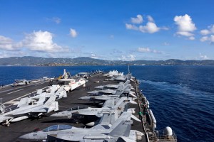 US carrier Ford to go to port temporarily after fire