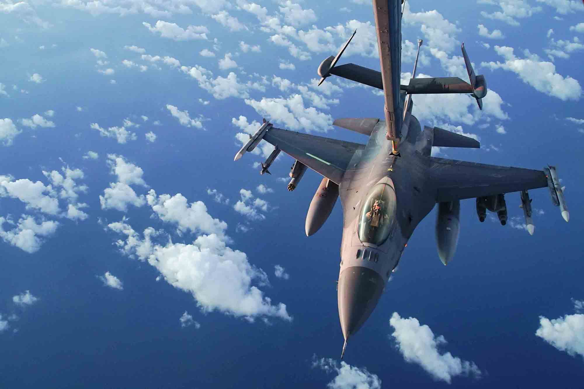 A U.S. Air Force F-16 Fighting Falcon receives fuel from a U.S. Air Force KC-10 Extender during an n-air refueling mission supporting Operation Octave Quartz with armed over-watch in Africa, Jan. 9, 2020.