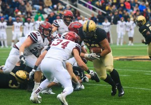 Woolfolk scores 3 times, Army holds off Colgate 28-14