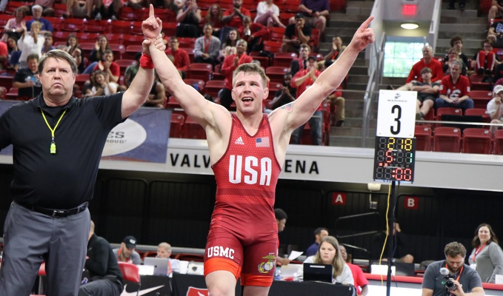 As Marine gears up for Olympic match, the Corps is disbanding its standing wrestling team