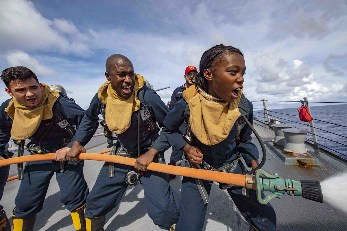 Sailors practice proper firefighting techniques during a damage control training drill June 26, 2019, aboard the Arleigh Burke-class guided-missile destroyer USS McCampbell (DDG 85) in the Philippine Sea.