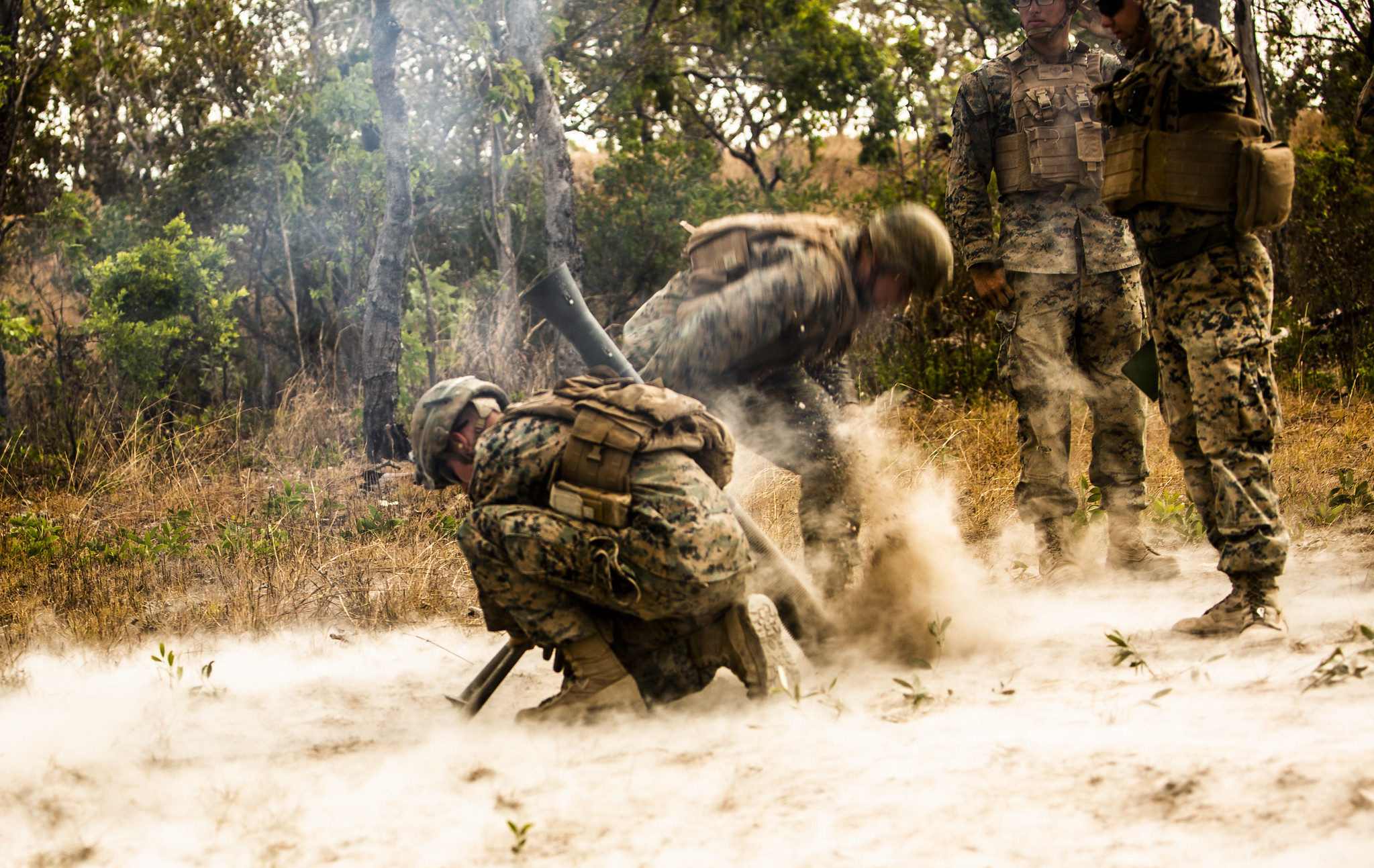 Marines with 3rd Battalion, 3rd Marine Regiment, a part of Marine Rotational Force - Darwin, fire an M252 81mm extended range mortar system during a fire support coordination exercise at Mount Bundey Training Area, Australia, Aug. 9, 2019.