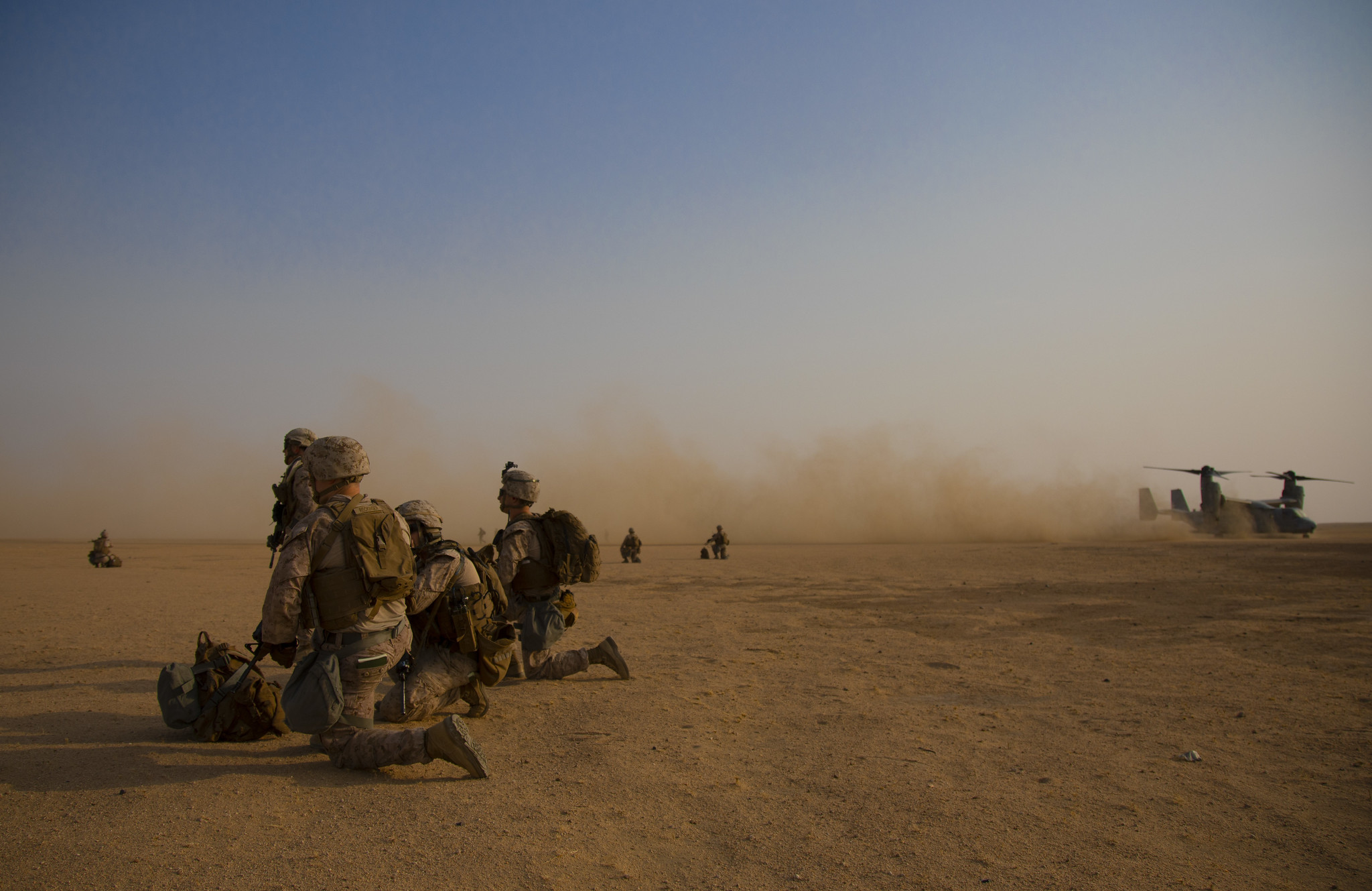 U.S. Marines with 1st Battalion, 7th Marine Regiment, attached to Special Purpose Marine Air-Ground Task Force Crisis Response-Central Command, post security during a tactical recovery of aircraft and personnel exercise at Camp Buehring, Kuwait, Aug. 7, 2019.