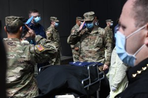 Service members honor veteran who died of COVID-19 at the Javits Center field hospital