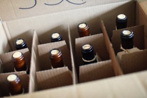 Who should pay extra fees for shipping alcohol?
