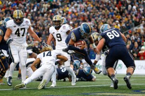 Keenan Reynolds leads Navy over Pitt 44-28 in Military Bowl