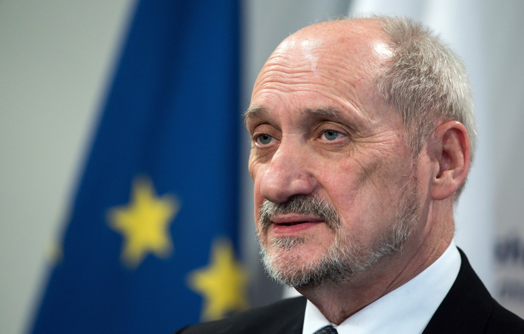 Polish lawmakers OK more defense spending with Russia in mind