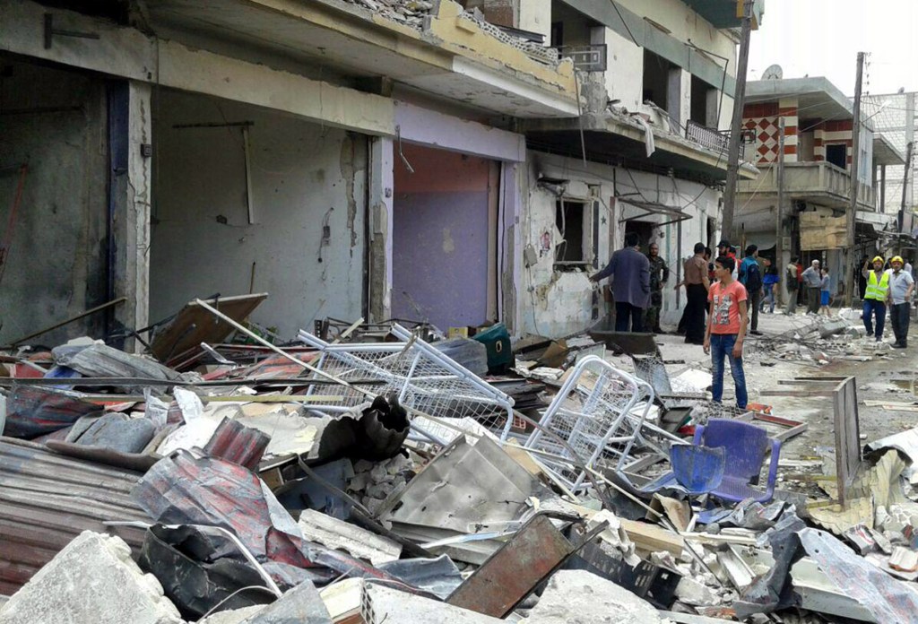 Russian, Syrian officials deny their planes hit refugee camp