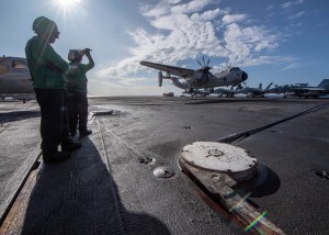 Navy’s ‘dinosaur’ carrier delivery plane flies into sunset
