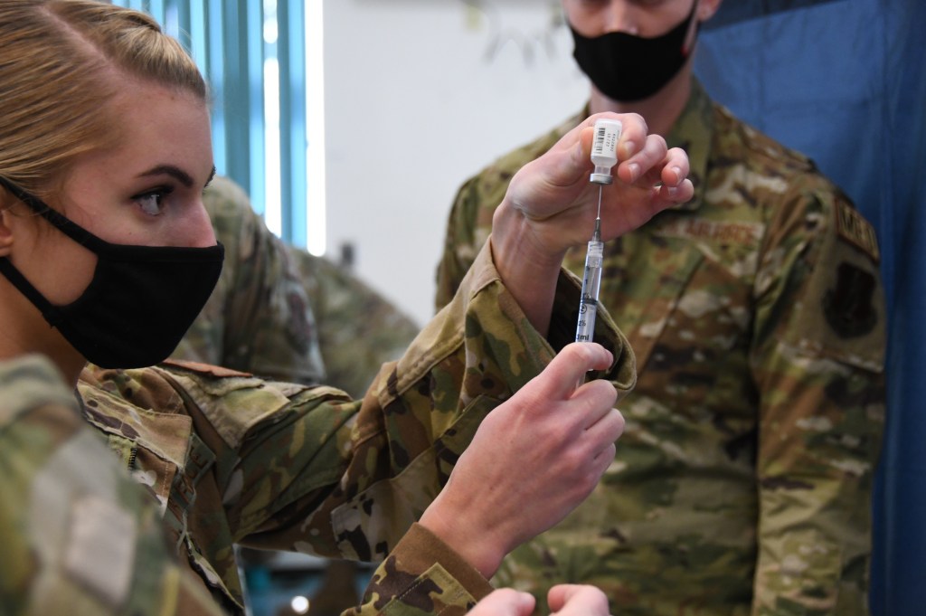 Defense policy bill with COVID vaccine repeal heads to Biden’s desk