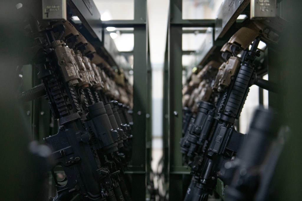 Military couple profited from stolen weapons parts, optics and other gear, indictment says