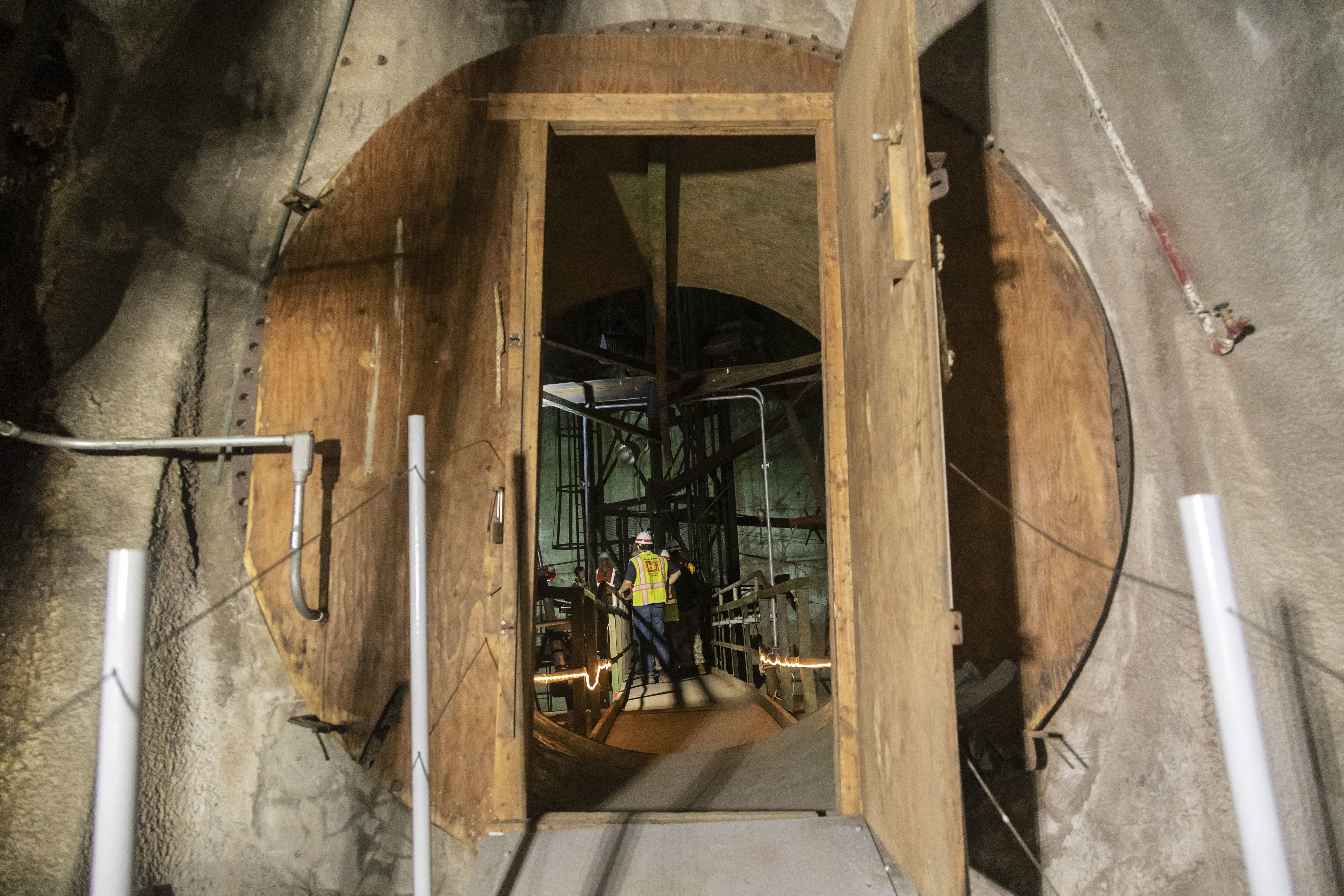 A group with the U.S. Army Corps of Engineers tour one of the empty tanks at Red Hill Bulk Fuel Storage Facility, Halawa, Hawaii, Feb. 24, 2023.