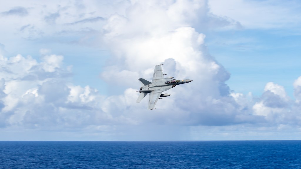 F/A-18 Super Hornet pilots practice touch-and-go landings — on Iwo Jima