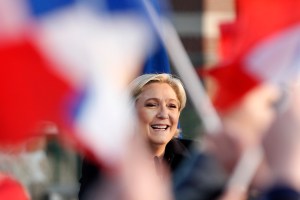 Hacking arrest, fake news in tense French presidential race
