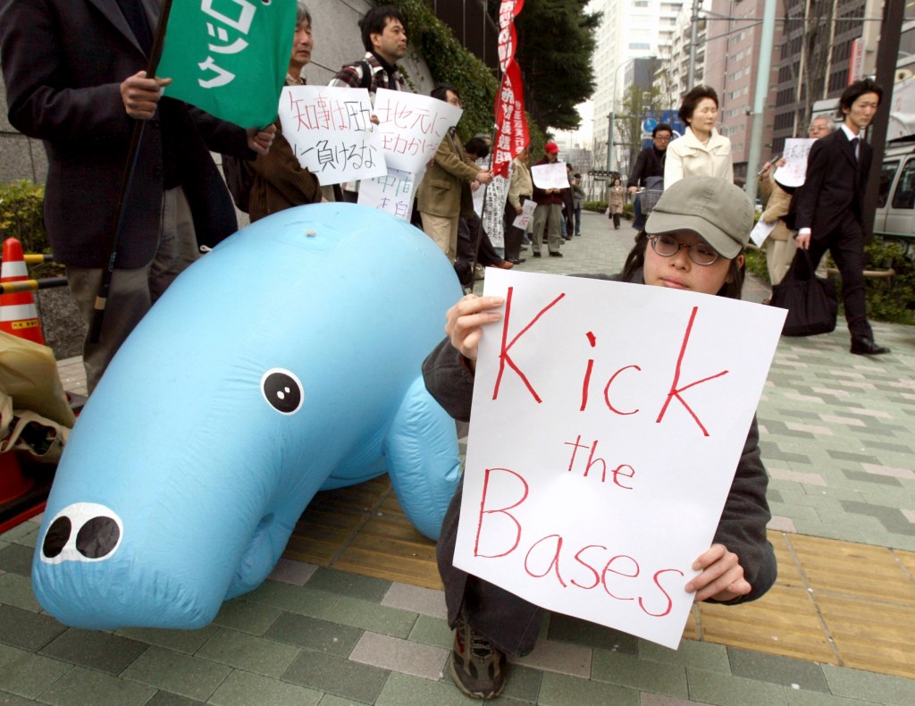 Appeals court revives suit over US military base in Japan