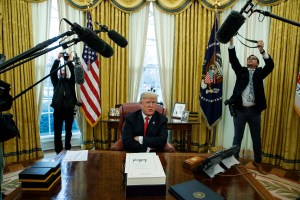 Trump signs stopgap spending bill into law to avert shutdown