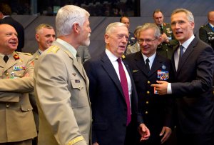 NATO trumpets resolve over Russia, plays down divisions