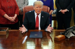 Trump order asks federal fund recipients to buy US goods