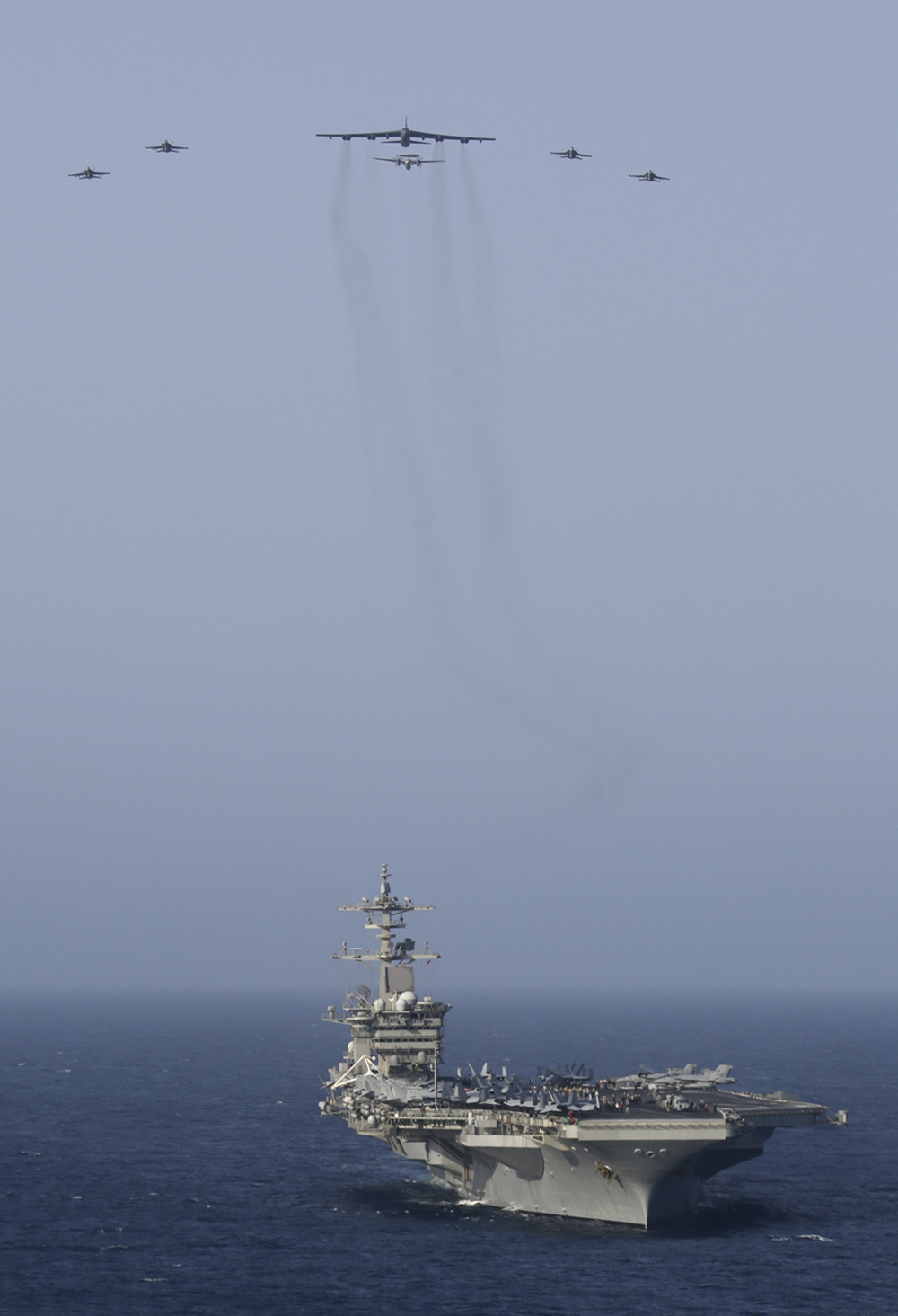 The Abraham Lincoln Carrier Strike Group and a U.S. Air Force B-52H Stratofortress conduct joint exercises in the Arabian Sea on June 1, 2019.