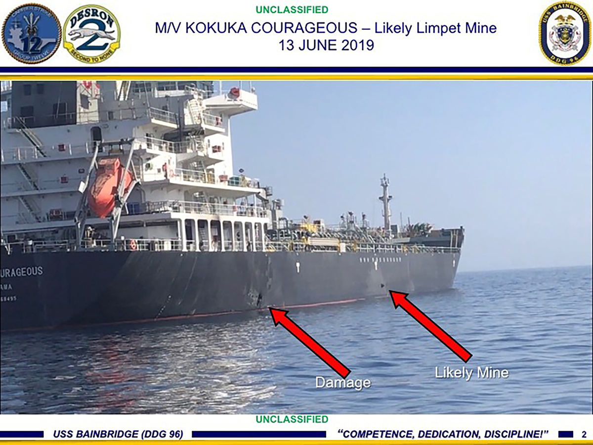 This June 13, 2019, image released by the U.S. military's Central Command, shows damage and a suspected mine on the Kokuka Courageous in the Gulf of Oman near the coast of Iran.