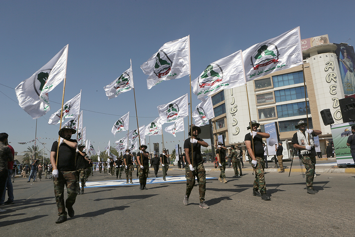 Iraqi Popular Mobilization Forces march in Baghdad, Iraq.