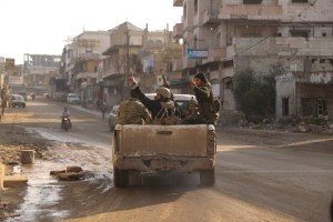 Syrian army enters key town as Turkey beefs up its troops