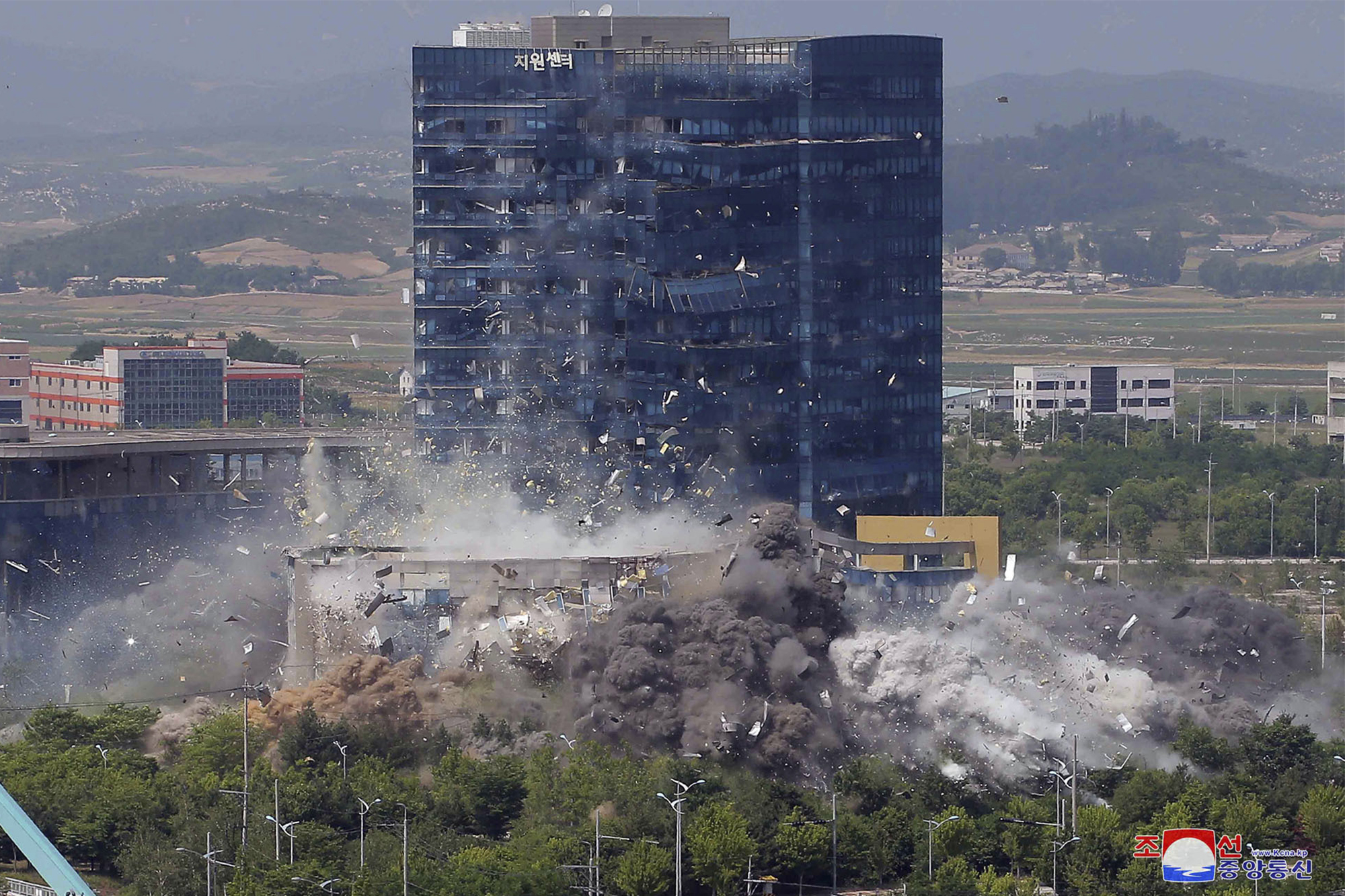 This photo provided by the North Korean government shows the explosion of an inter-Korean liaison office building in Kaesong, North Korea, Tuesday, June 16, 2020.