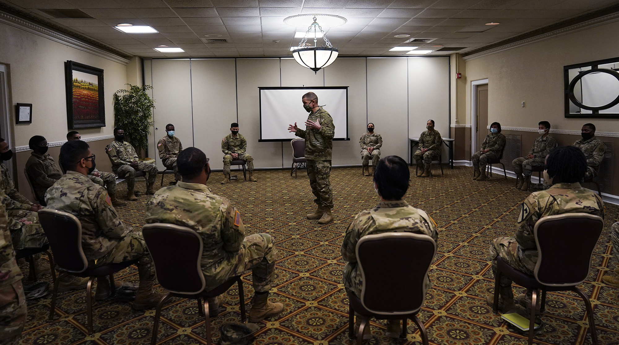 Sergeant Major of the Army Michael Grinston, center, gets feedback from soldiers about their concerns at Fort Hood, Texas, Thursday, Jan. 7, 2021.