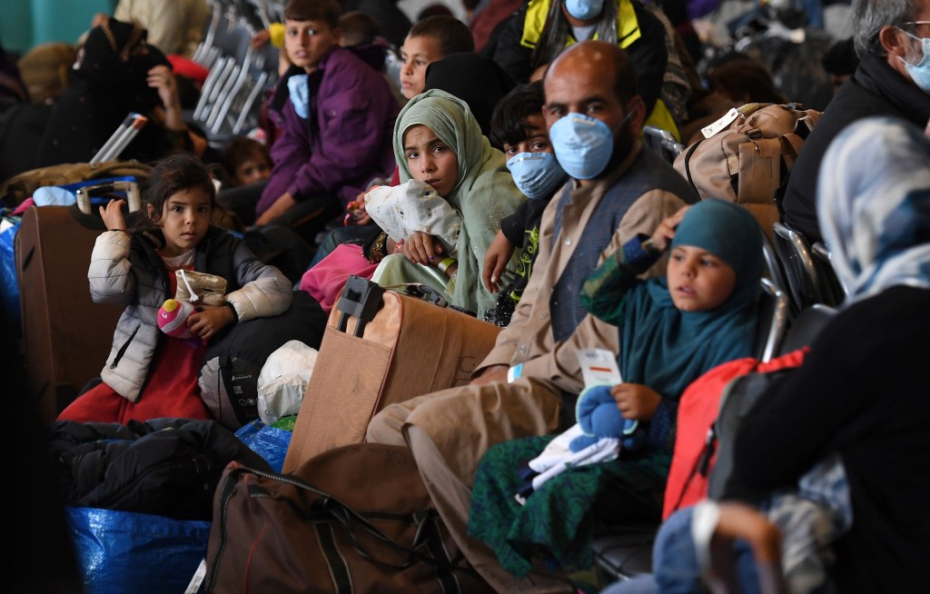 Money for Afghan refugees but not military pay boost in latest federal budget plan