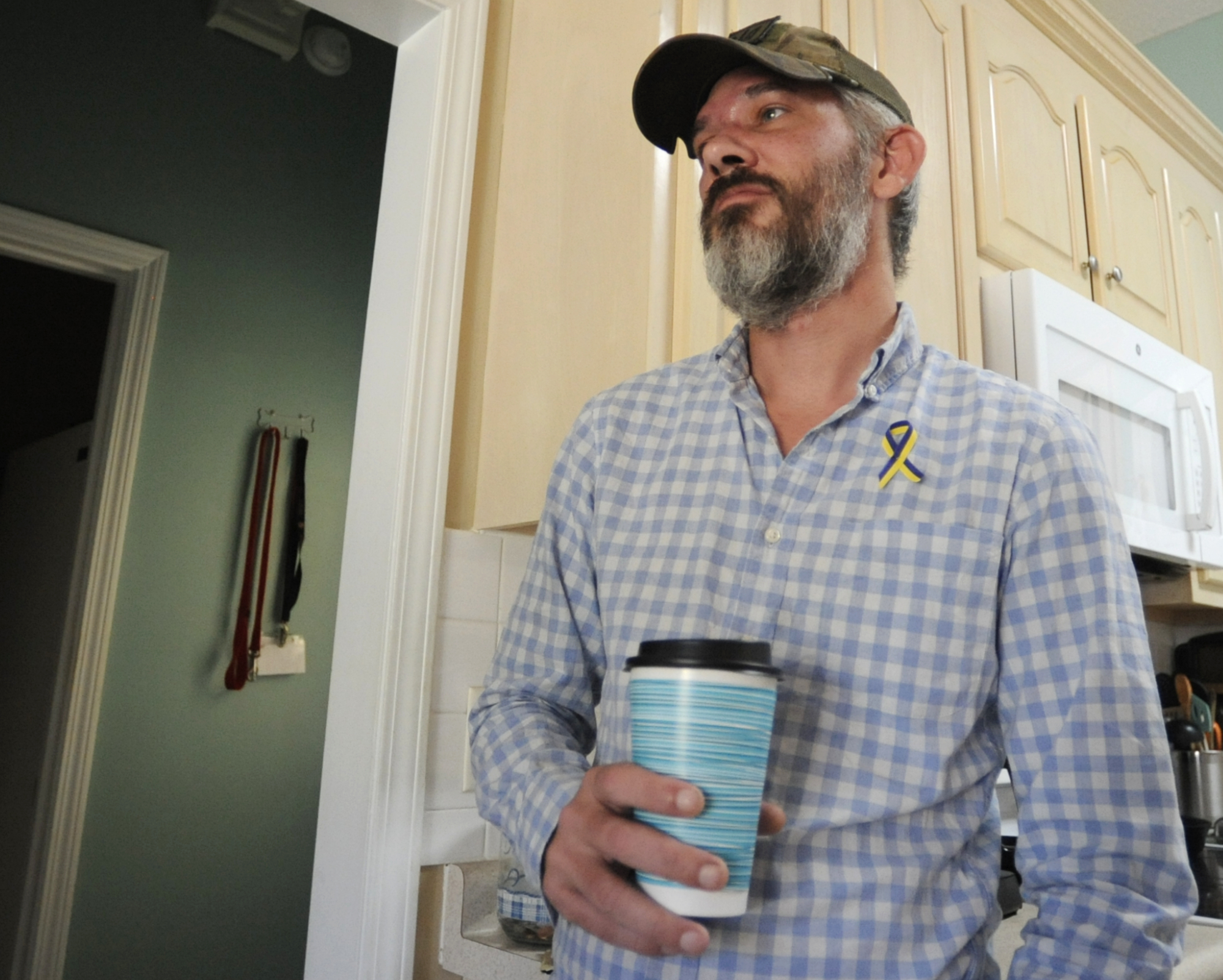 Alex Drueke, recently released from three months of Russian captivity, pauses during an interview at home in Tuscaloosa, Ala., on Friday, Sept. 30, 2022.