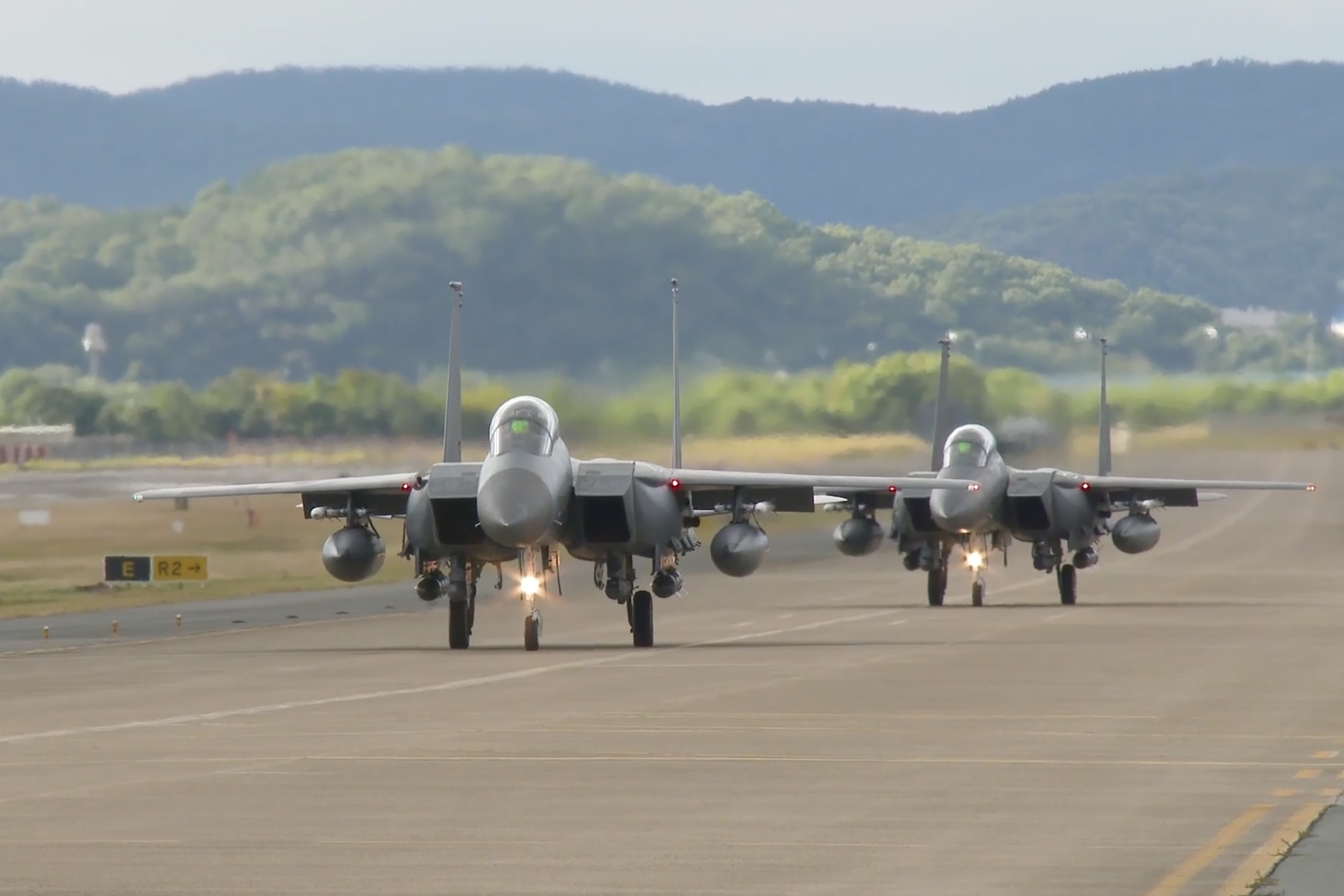In this image taken from video, South Korean Air Force's F15K fighter jets prepare to take off Tuesday, Oct. 4, 2022, in an undisclosed location in South Korea.