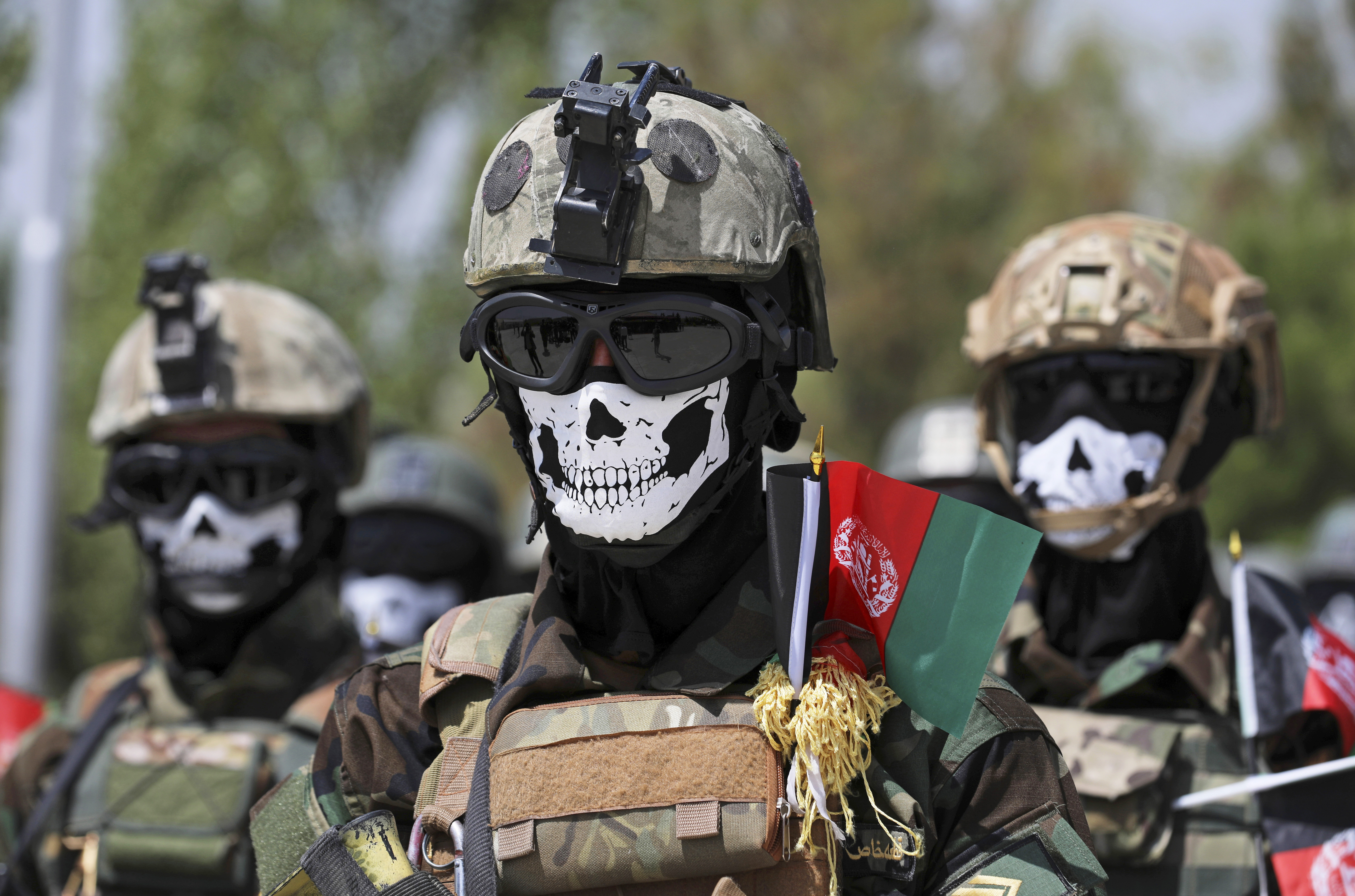 New Afghan Army special forces members attend their graduation ceremony after a three-month training program at the Kabul Military Training Center in Kabul, Afghanistan, Saturday, July 17, 2021.