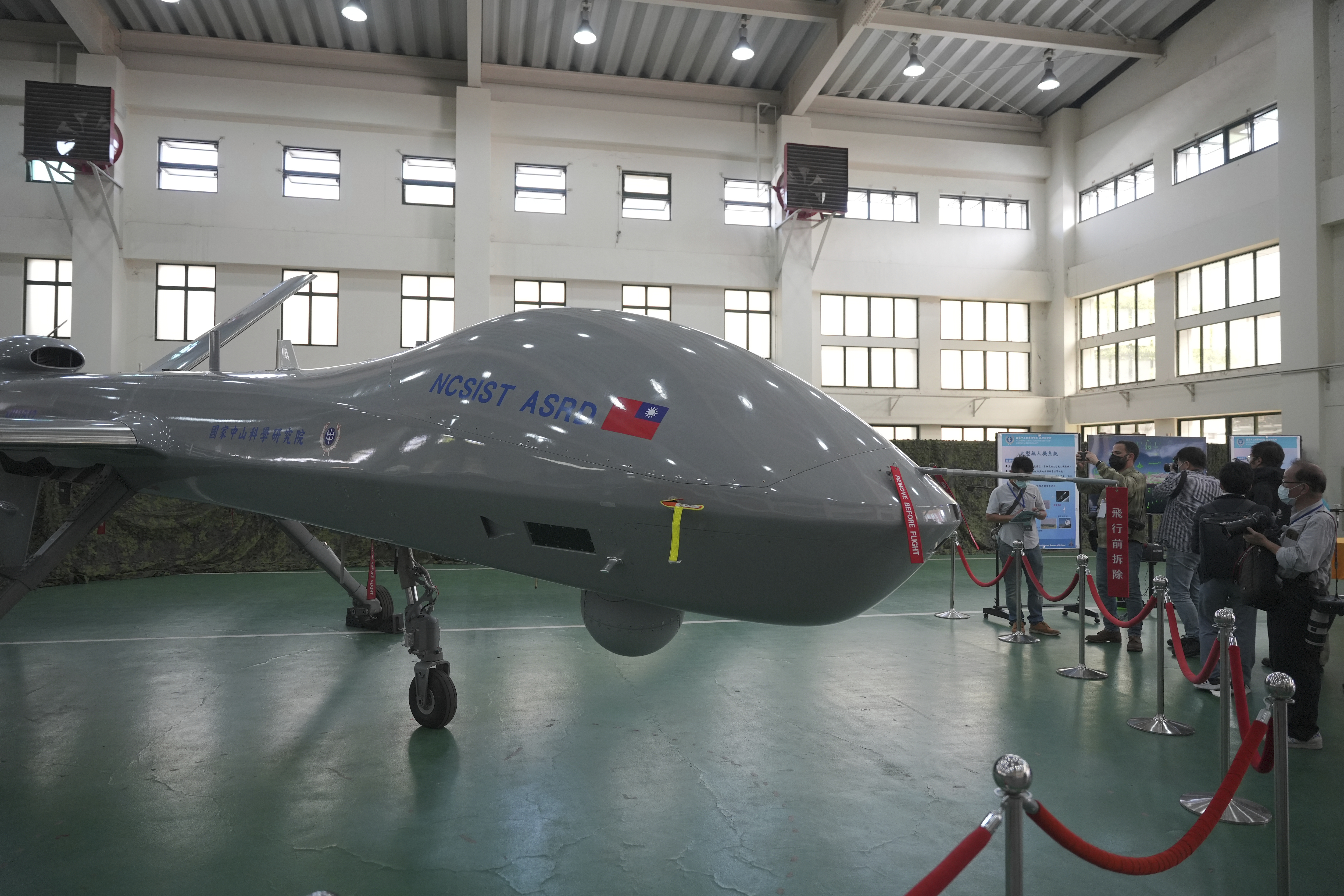 Members of the media look at the Taiwanese developed large UAV Teng Yun, which resembles the American MQ-9 Reaper and can stay aloft for up to 24 hours at the National Chung-Shan Institute of Science and Technology in Taichung in central Taiwan on Tuesday, Nov. 15, 2022.