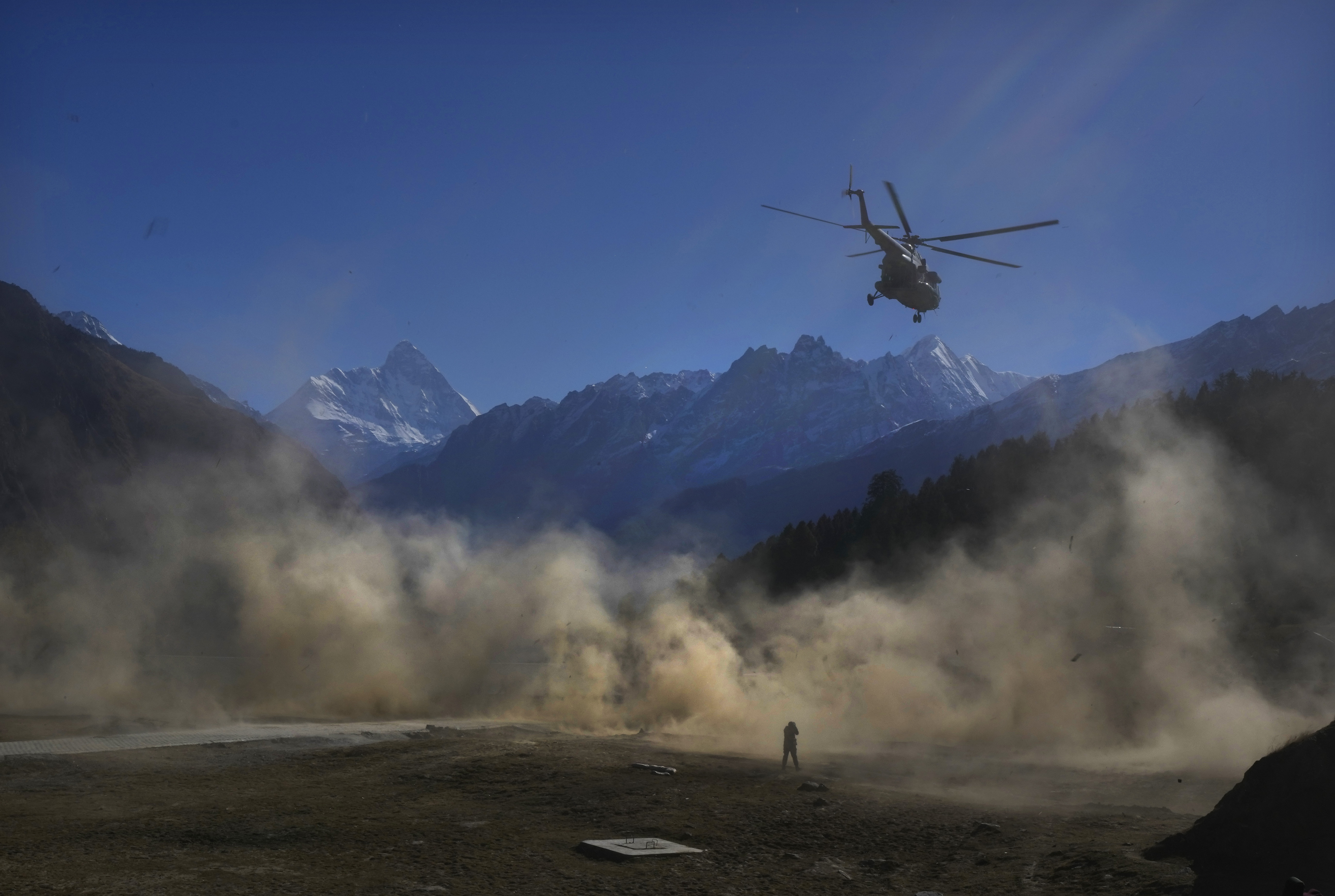 A helicopter carrying Indian army soldiers takes off during Indo-US joint exercise or "Yudh Abhyas," in Auli, in the Indian state of Uttarakhand, Tuesday, Nov. 29, 2022.