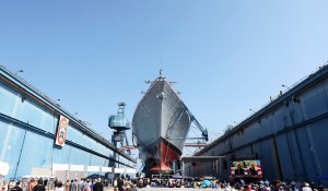 Medal of Honor recipient watches as ship bearing his name is christened