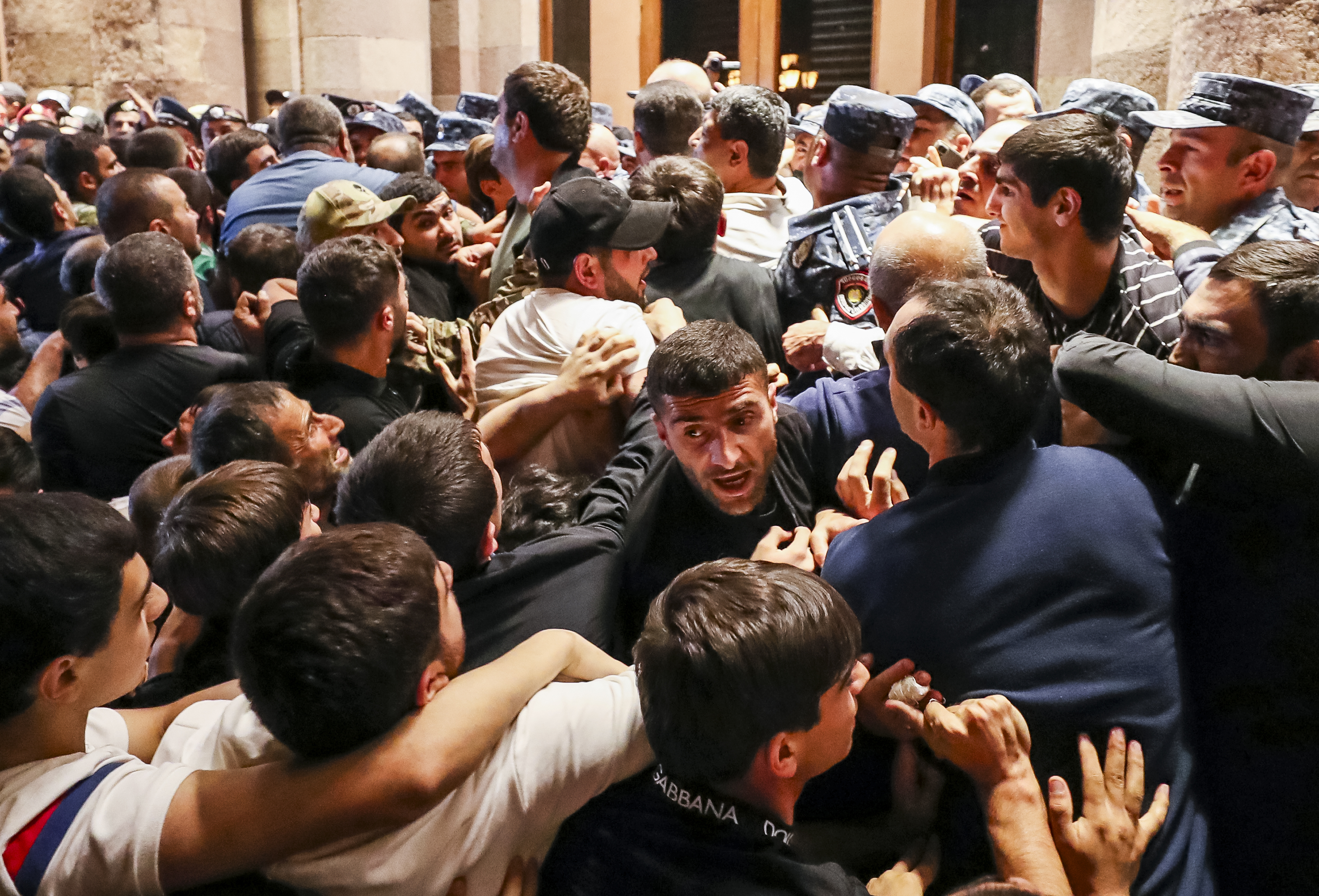 Demonstrators clash with police at the Armenia government building to protest against Prime Minister Nikol Pashinyan, Tuesday, Sept. 19, 2023, in Yerevan, Armenia.