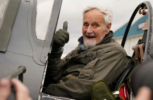 102-year-old British veteran flies Spitfire on bumpy charity ride
