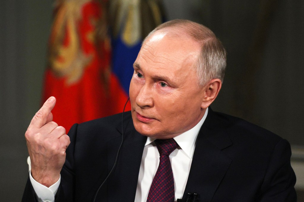 Putin urges US to push Ukraine to talks, hints at swap for reporter