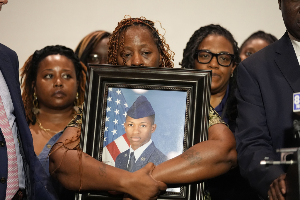Bodycam footage shows deputy shot airman seconds after opening door