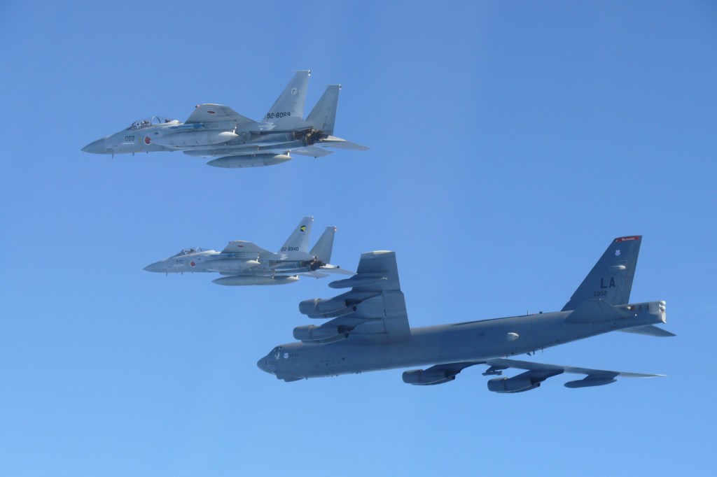 Pacifist Japan moving from exclusive self-defense to military buildup