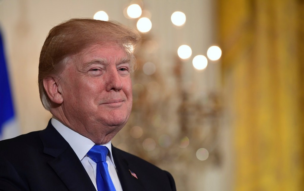 After veto threat, Trump signs full-year federal budget deal