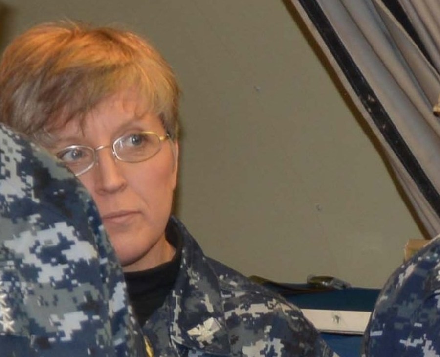 Navy captain charged with steering defense contracts to her own company