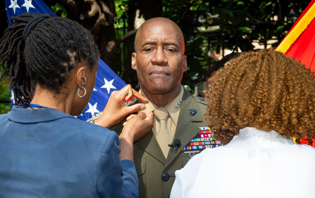 Ditching promotion file photos may have helped minorities, report says