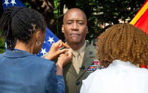 Ditching promotion file photos may have helped minorities, report says