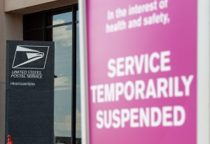 Post office machine removals spark election concerns, suit
