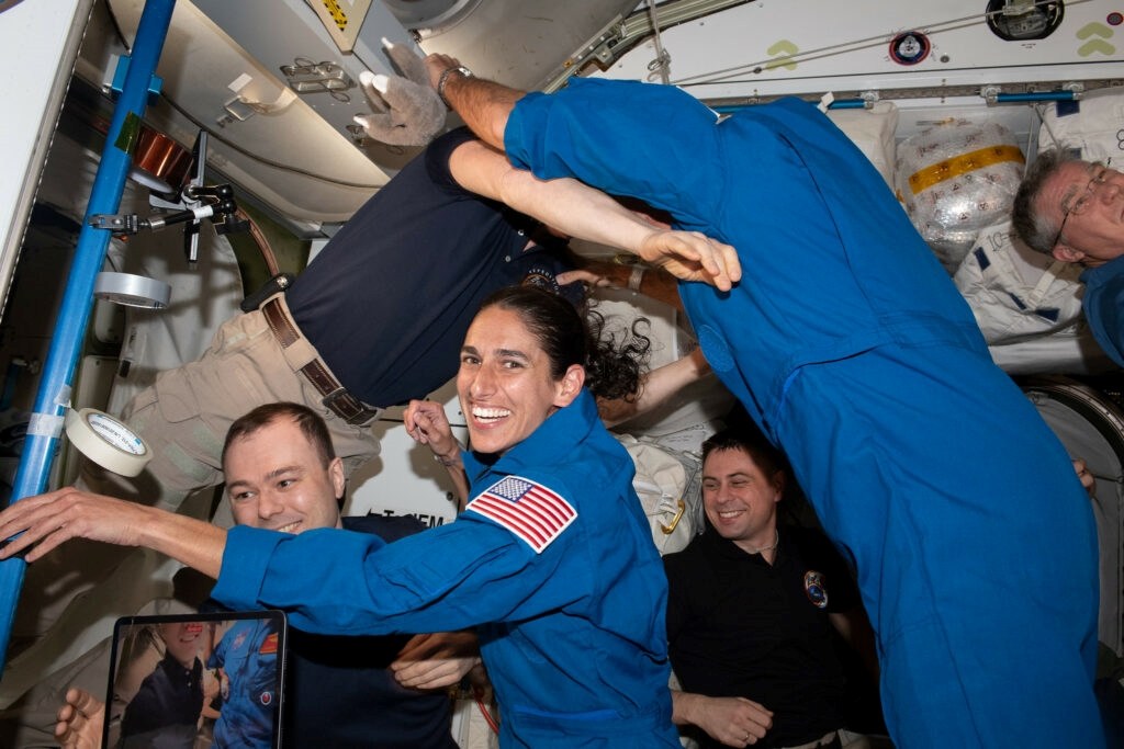 Marine test pilot settles into International Space Station